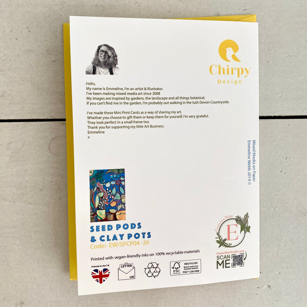 A printed card or postcard from Chirpy Design lies on a light gray textured surface, partially tucked into a yellow envelope. The white card features a portrait, a quote, a colorful artwork, and text including 'Seed Pods & Clay Pots' and 'Code: EWSP04 26'.