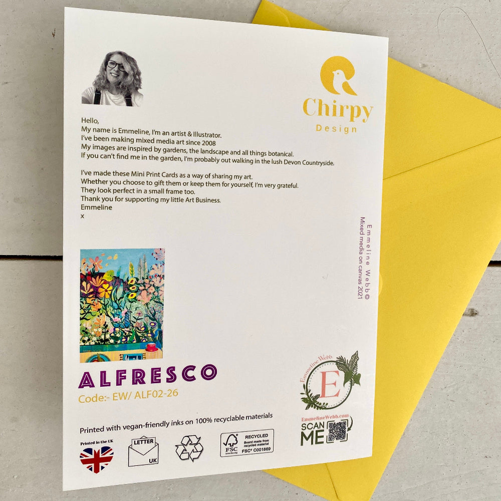 A printed invitation card for 'Alfresco' by 'Chirpy Design' is shown on a light gray textured surface with a bright yellow envelope behind it. The card features a colorful abstract painting, text, and various eco-friendly and contact details.
