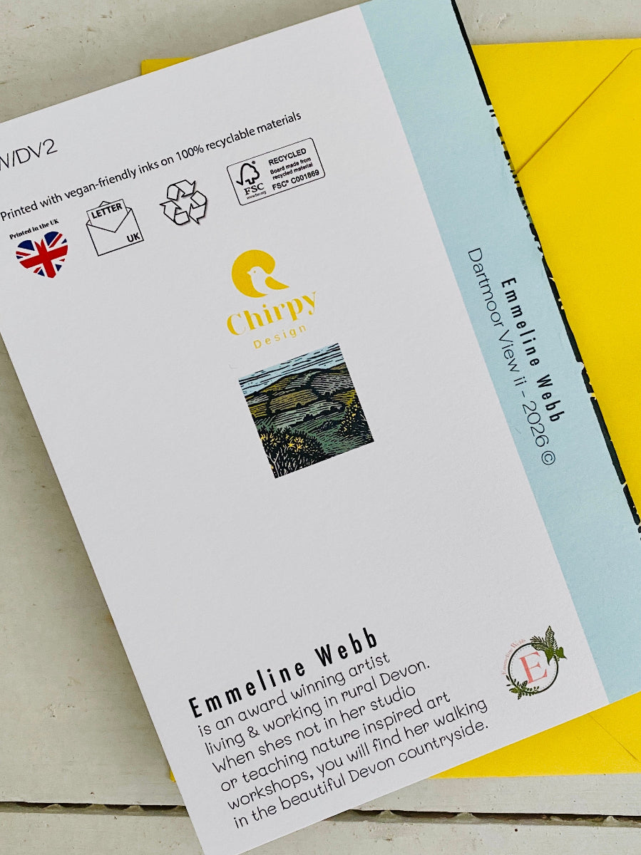 A printed card or booklet page from Chippy Design featuring artwork and text, placed on top of a bright yellow envelope. The page includes product information, a small landscape photo, and branding for Emmeline Webb.
