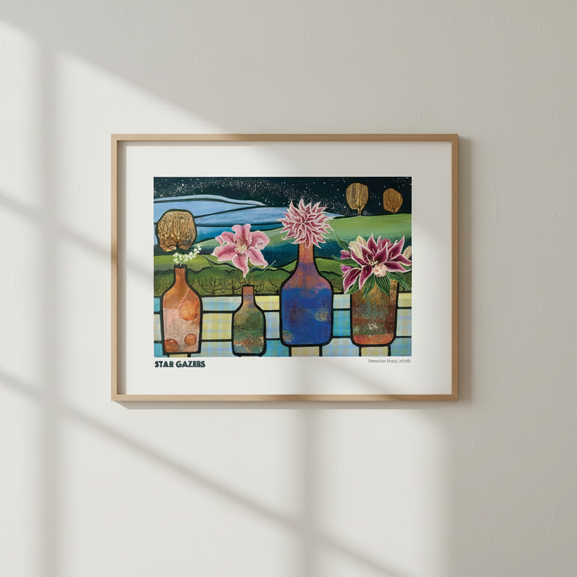 A framed art print titled '4 PM GAMES' hangs on a light beige wall, casting soft window-shadow lines. The print features a colorful, stylized illustration of four flower-filled glass bottles against a night sky, enclosed in a light wood frame with a white mat.